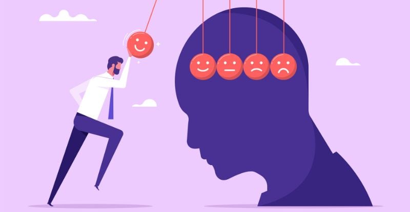 An illustration of a person interacting with a pendulum featuring balls transitioning from happy faces on one side to sad faces on the other, symbolizing emotional balance and mental health.