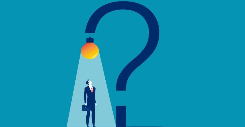 An illustration on a blue background featuring a large dark blue question mark with a glowing bulb hanging at its curve. The light from the bulb illuminates a man carrying a suitcase, standing underneath and looking up at it, symbolizing curiosity and seeking answers.