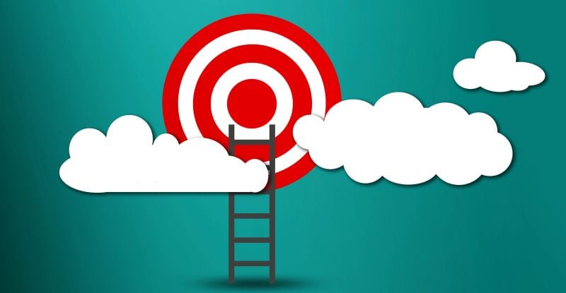 An illustration of a target circle hovering above the clouds, with a ladder extending upward toward the target, symbolizing the journey of reaching one’s goals.